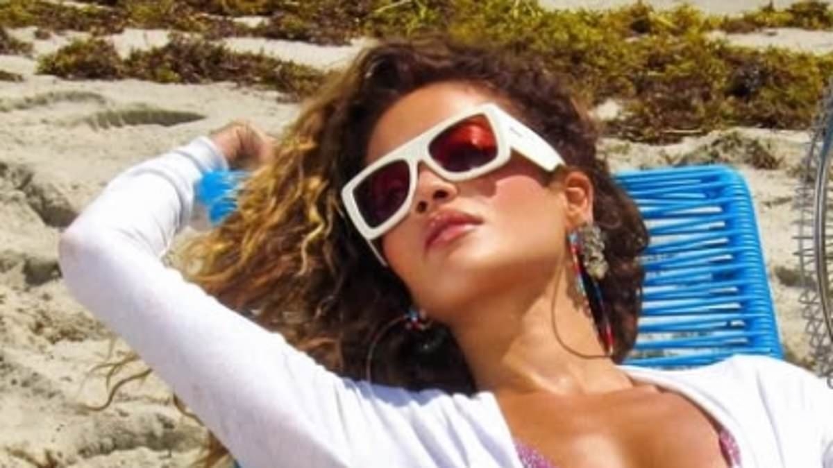 Rita Ora puts on a VERY cheeky display in hot pants and tiny bikini as she teases her upcoming single