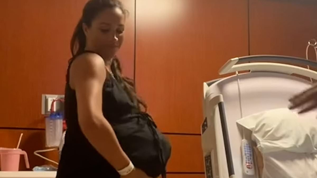 Conspiracy theorists share bizarre claims over Meghan Markle's twerking video saying baby bump is FAKE and it wasn't filmed inside hospital