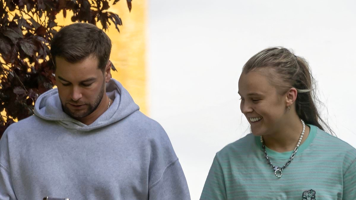 EXCLUSIVE Chris Hughes cosies up to new girlfriend JoJo Siwa as she wins over his parents during a trip to The Cotswolds after the couple finally confirmed their romance
