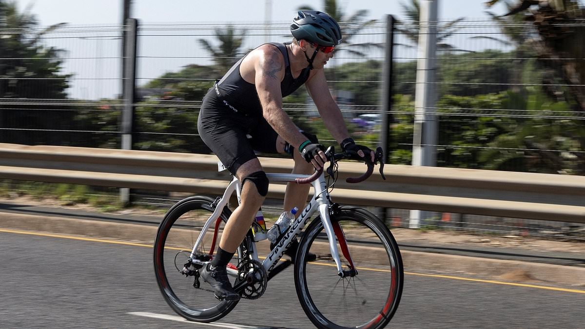 Oscar Pistorius makes his return to sport: Blade Runner is seen competing in triathlon 12 years after murdering Reeva Steenkamp