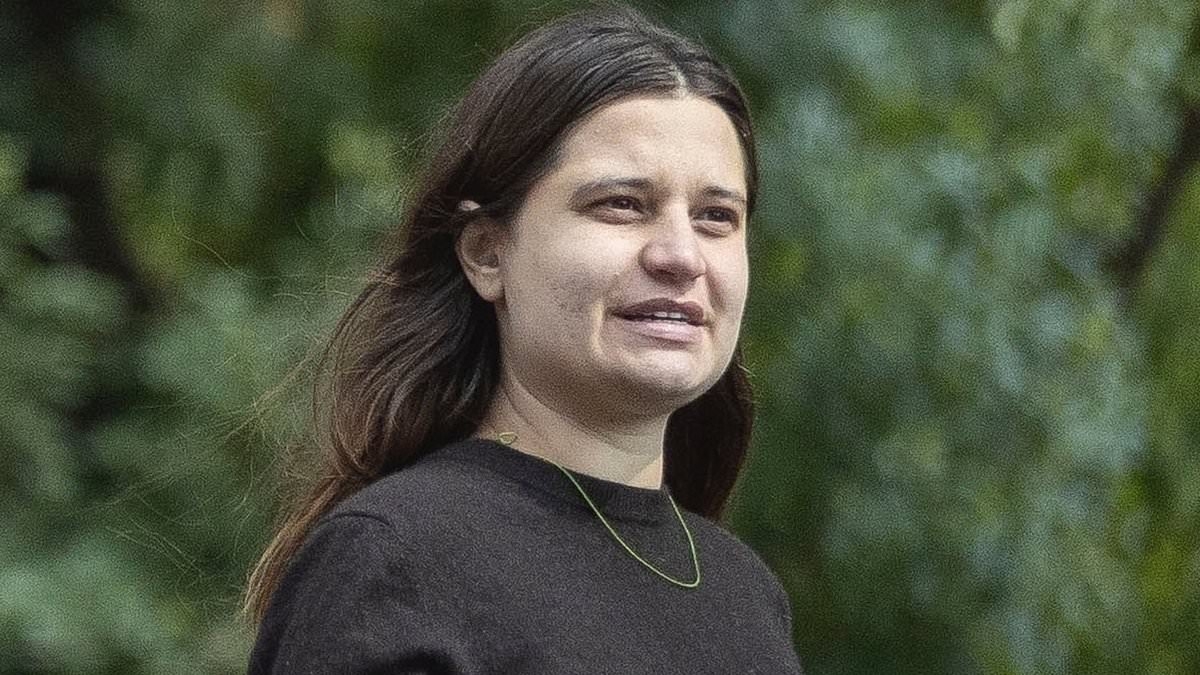 Pregnant Tiger Lily Hutchence displays her baby bump and flashes gold band on her wedding finger as she steps out weeks after 'secretly marrying partner Ben Archer'