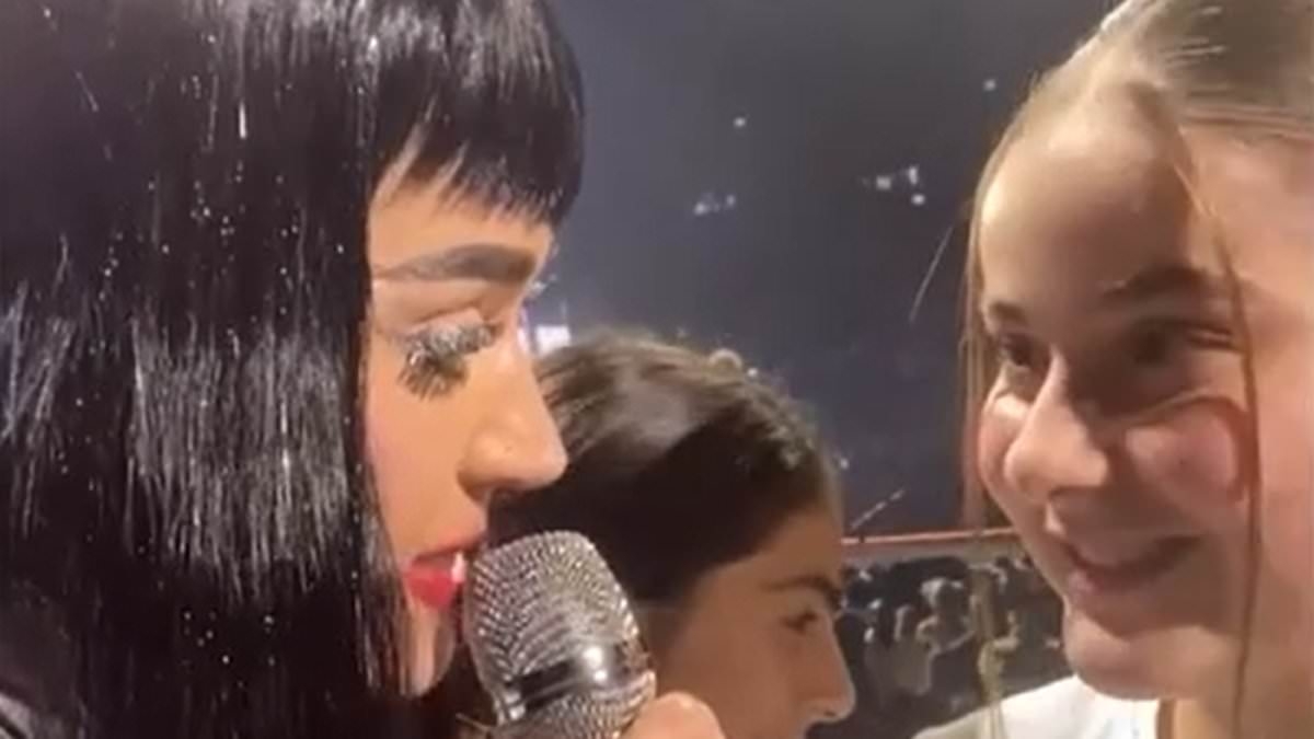 Sweet moment Katy Perry begs young girl's teacher to excuse her from exam as she invites her on stage in Sydney