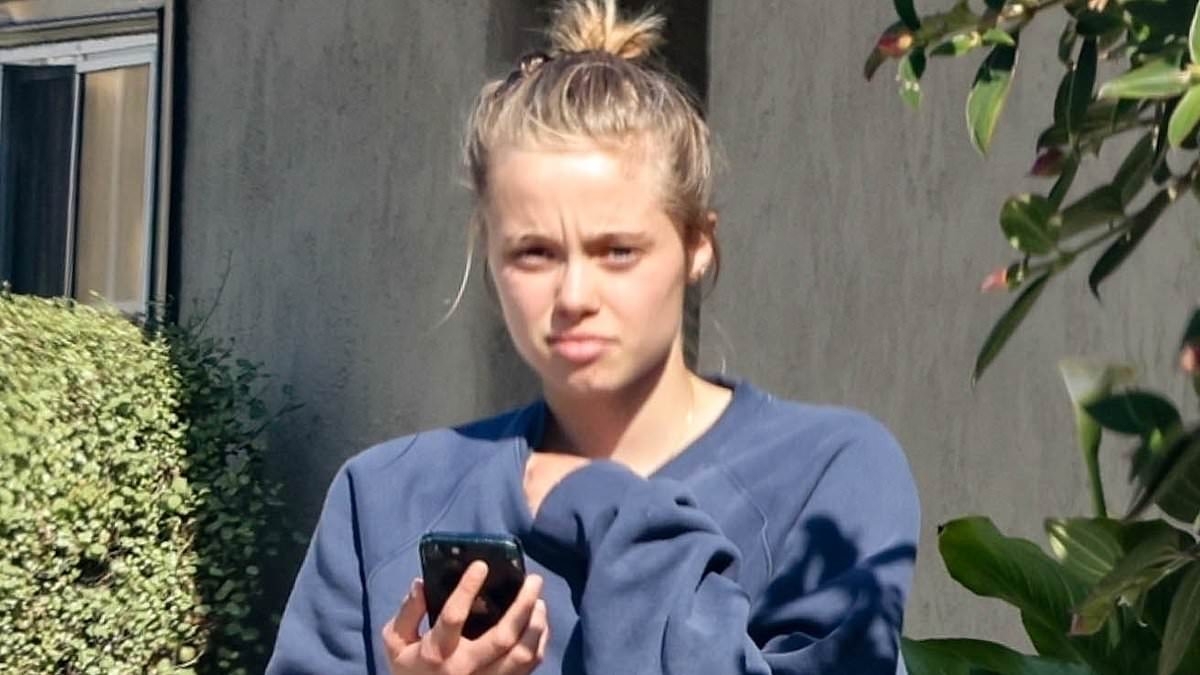 Angelina Jolie's daughter Shiloh, 18, looks just like dad Brad Pitt in new images... after teen dropped his last name