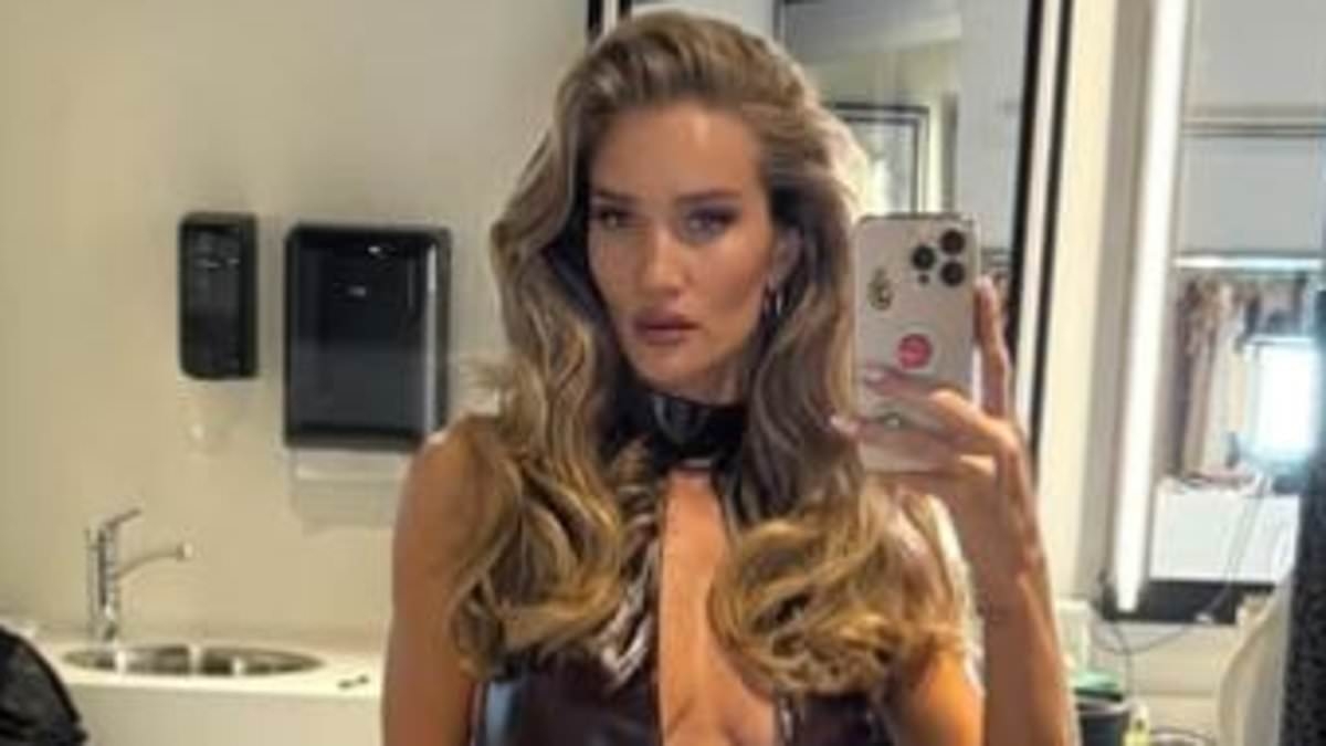 Rosie Huntington-Whiteley puts on a VERY leggy display in a racy burgundy leather dress for sizzling Gisou shoot