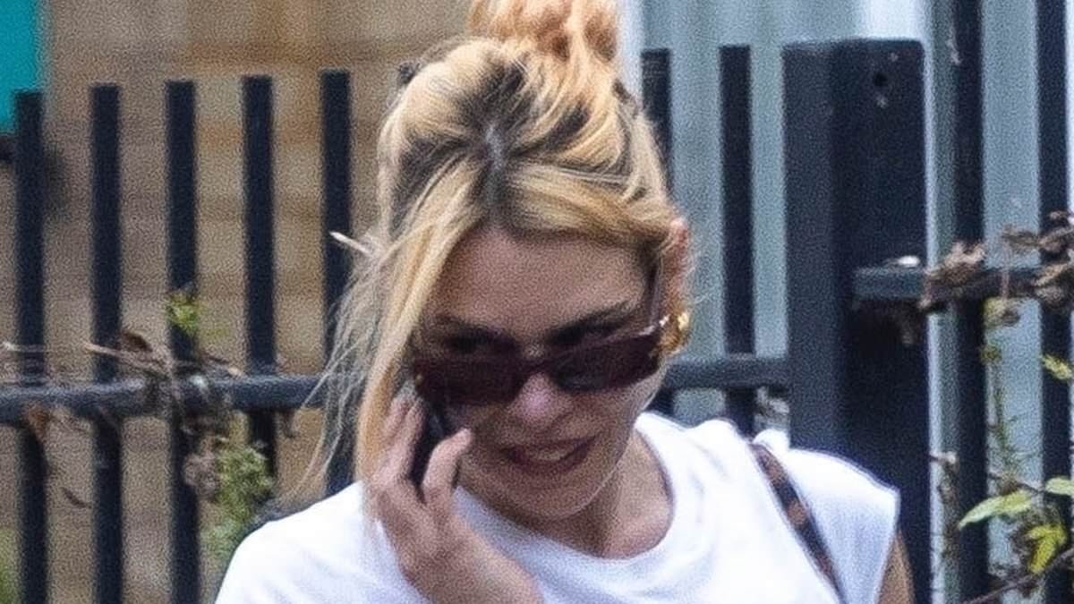 Billie Piper makes VERY bold fashion statement in heeled bejewelled Crocs after 'rekindling relationship with ex boyfriend Johnny Lloyd'