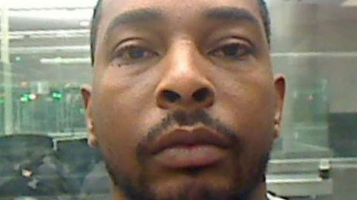 Fugitive accused of wiping out New York family including kids aged two and four is captured in tourist spot