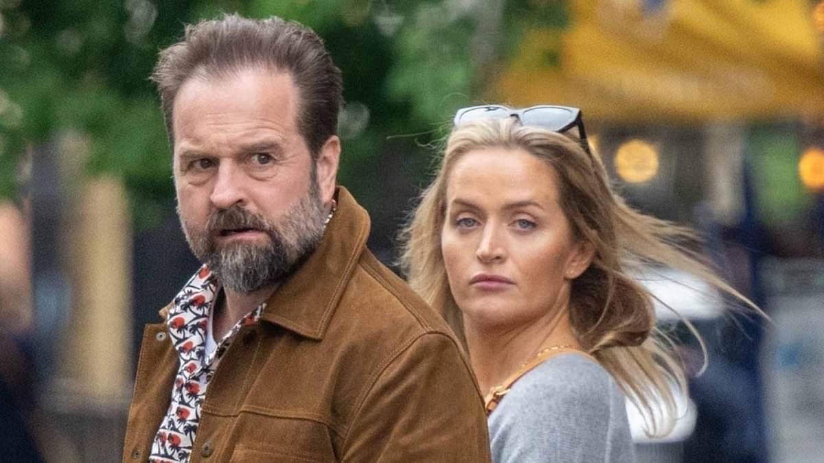 Alfie Boe enjoys romantic date with mystery blonde as he finally finds happiness after 'brief romance' with Hannah Waddingham and marriage split following 'secret dates with another woman behind wife's back'