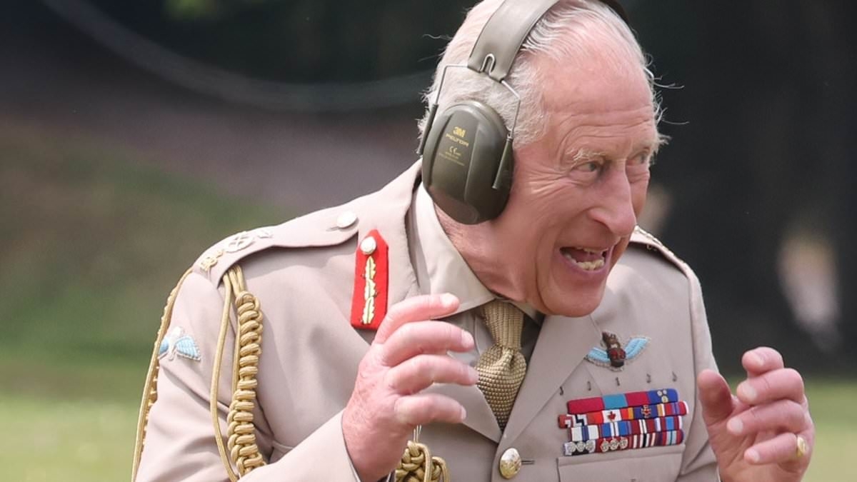 King Charles puts on an animated display as he fires gun during visit to Royal Regiment of Artillery - and is praised for his 'faultless' technique