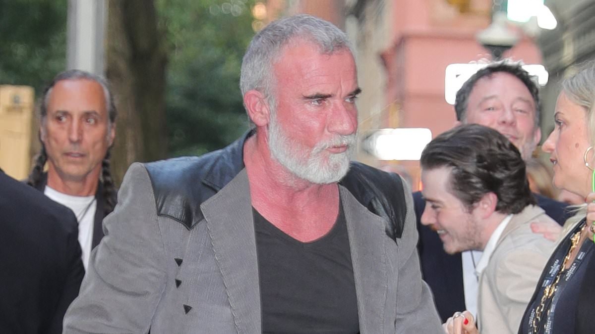 Guess who! Aussie actor looks unrecognisable as he steps out for VERY famous pop star step-daughter's New York premiere