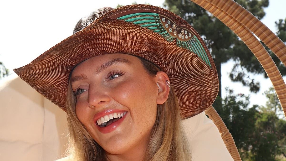 Perrie Edwards puts on a very busty display in a nude bikini and cowboy hat as she shares sizzling poolside snaps