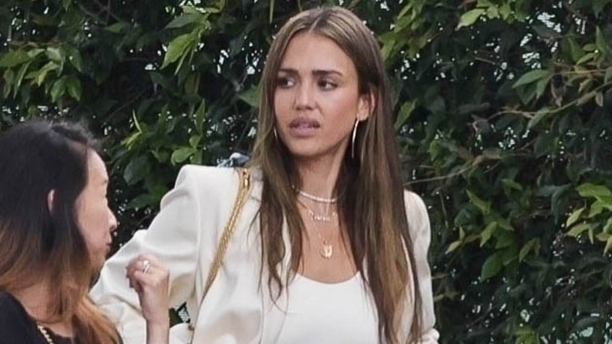 EXCLUSIVE Jessica Alba looks MISERABLE reuniting with estranged husband Cash Warren at daughter's graduation