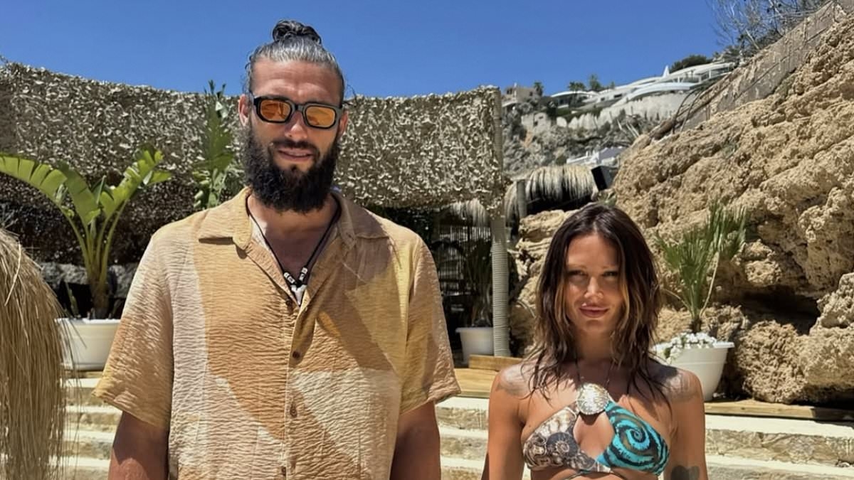 'Tensions between Andy Carroll and ex Billi Mucklow are set explode' as he shares holiday snaps with girlfriend Lou Teasdale while she's at home with their children