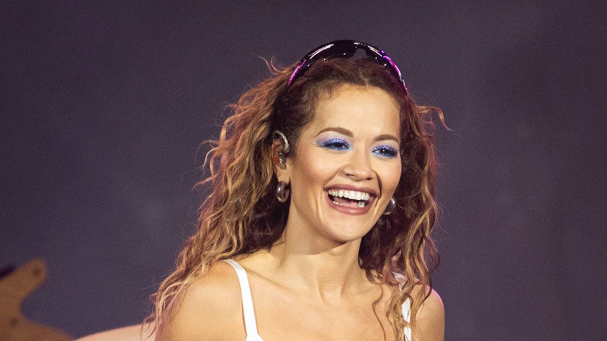Rita Ora puts on a VERY racy display as she strips to her bra and lacy blue hotpants as she performs at World Club Dome Festival in Frankfurt