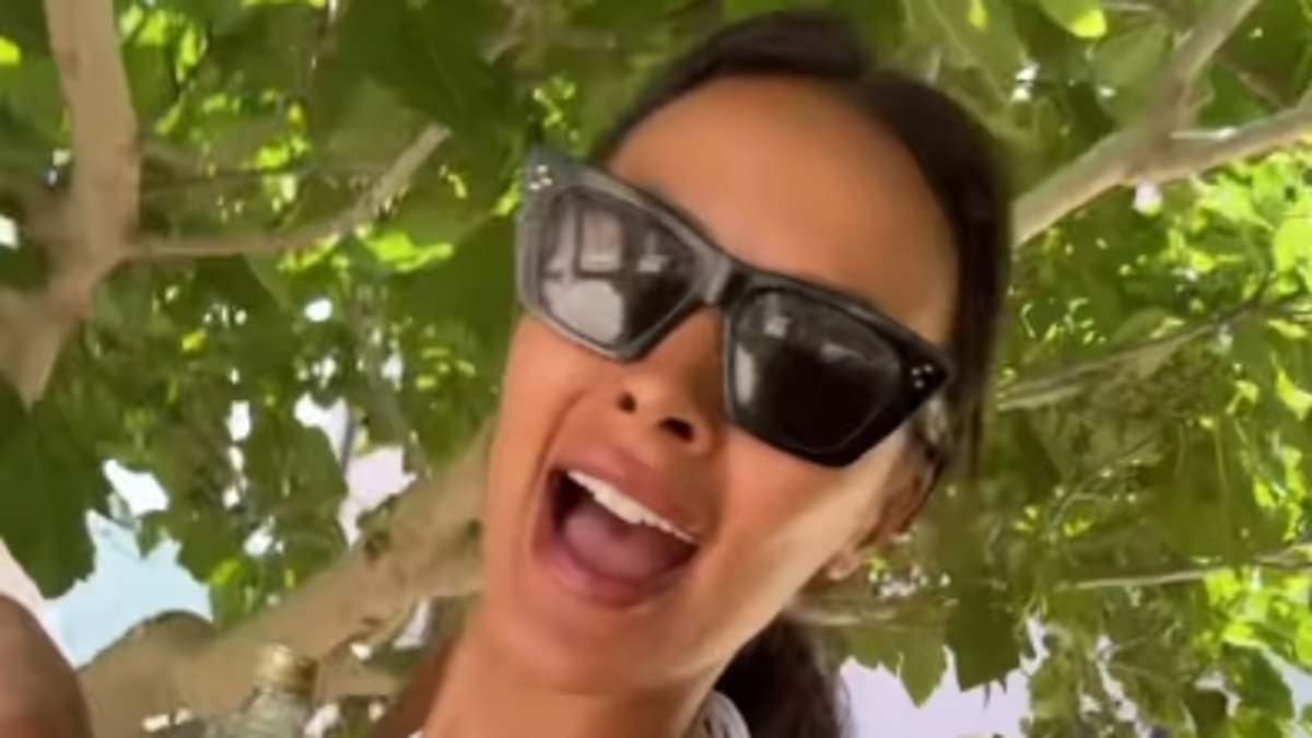 Maya Jama puts on a VERY busty display in a skimpy white bikini as she shares a fun dance clip in Majorca ahead of Love Island's new series