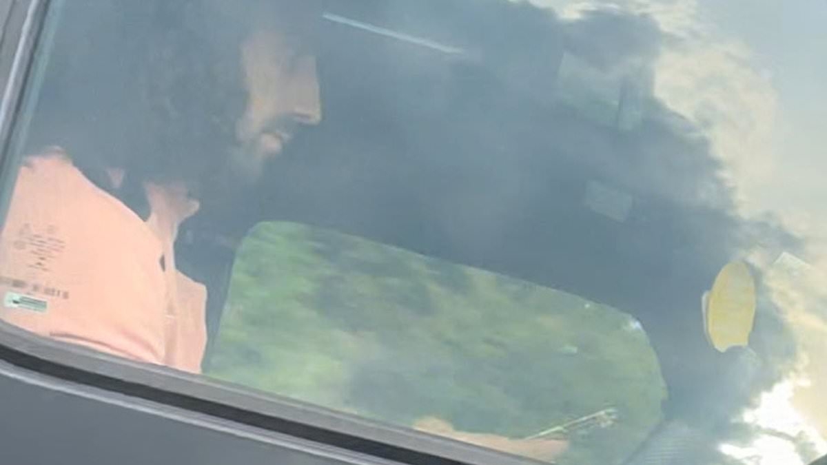 Moment Chelsea FC star Marc Cucurella is caught 'using his phone behind the wheel' of his £140k Mercedes G-Wagon