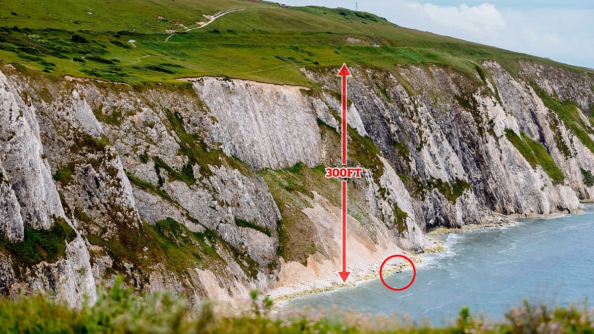 Police still probing crash that saw car plunge off 300ft cliff - killing two: Witnesses tell of watching 'man be pulled from wreckage'