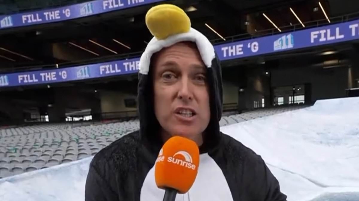 Shock moment Sunrise host Matt 'Shirvo' Shirvington is pushed into a pool of ice water during live cross