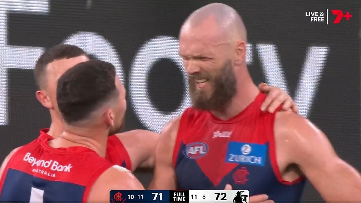 Tempers flare between Melbourne team-mates after the final siren as Collingwood hold on against the Demons to seal tense one-point win