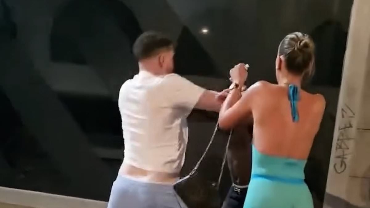 Shocking moment Brits cheer as two men engage in street brawl while woman begs them to stop in latest violent scene involving Brits to spark anger in Tenerife