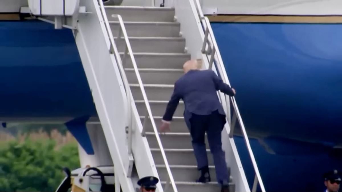 Trump takes a tumble while boarding Air Force One - after mocking Biden for doing the same