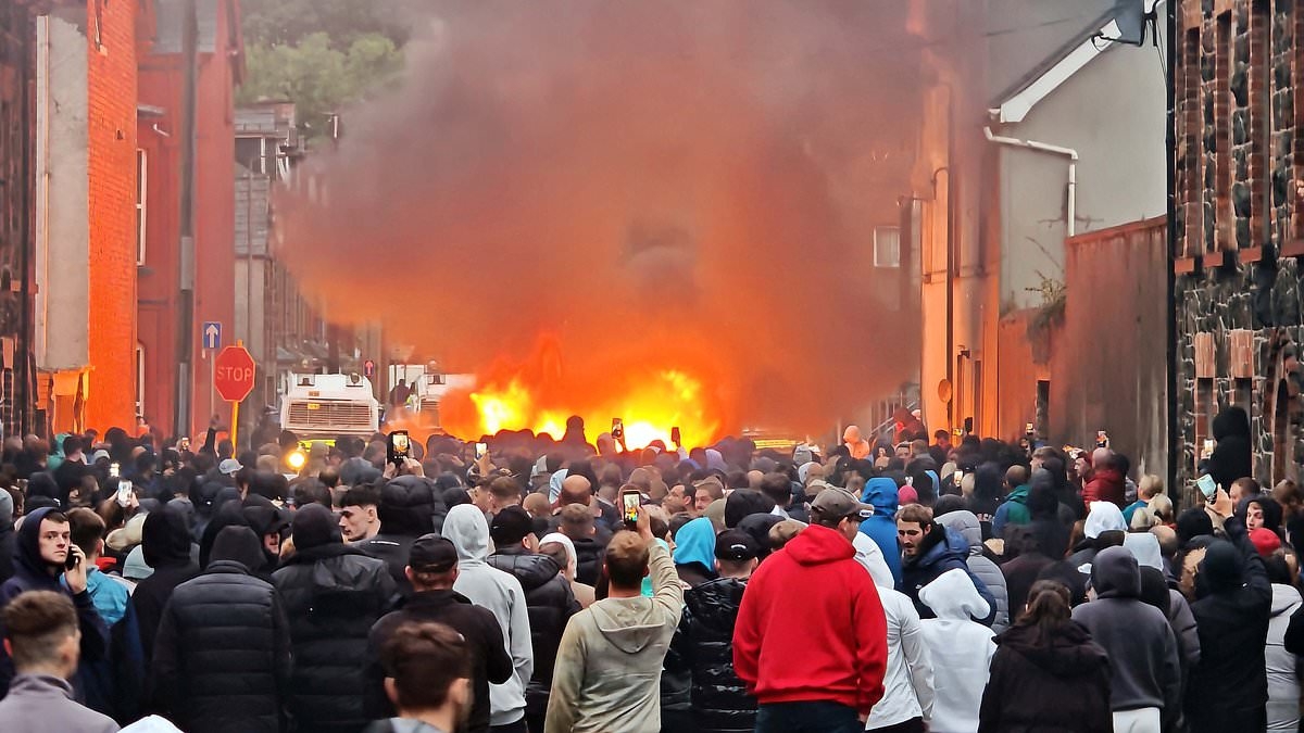Riots break out in Northern Ireland after two 14-year-olds who appeared in court over an attempted rape needed a Romanian interpreter