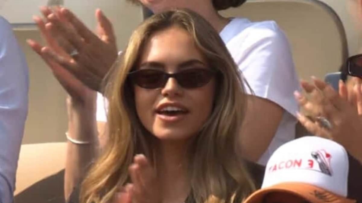 F1 star Mick Schumacher's model ex-girlfriend sparks Jannik Sinner dating rumours as she watches his French Open final defeat... months after the pair were 'spotted in her hometown'