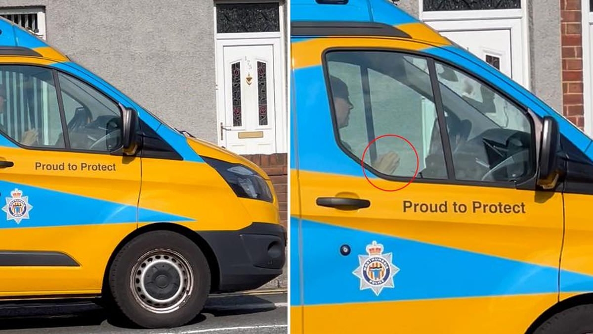 Shocking moment police camera van officer is caught with no hands on the wheel while driving