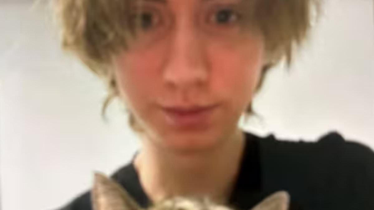 BREAKING NEWS Pictured: Austrian school shooter holds his pet cat as it's revealed he asked mother 'forgive me for what I am about to do' in farewell message and begged that his treasured pet would be taken care of