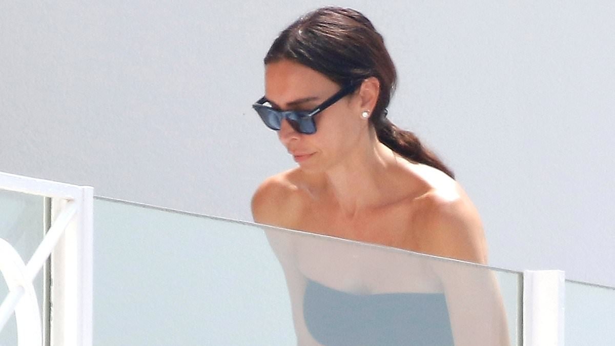 EXCLUSIVE Christine Lampard shows off her washboard abs in black bandeau bikini as she soaks up the sun with husband Frank during South of France holiday