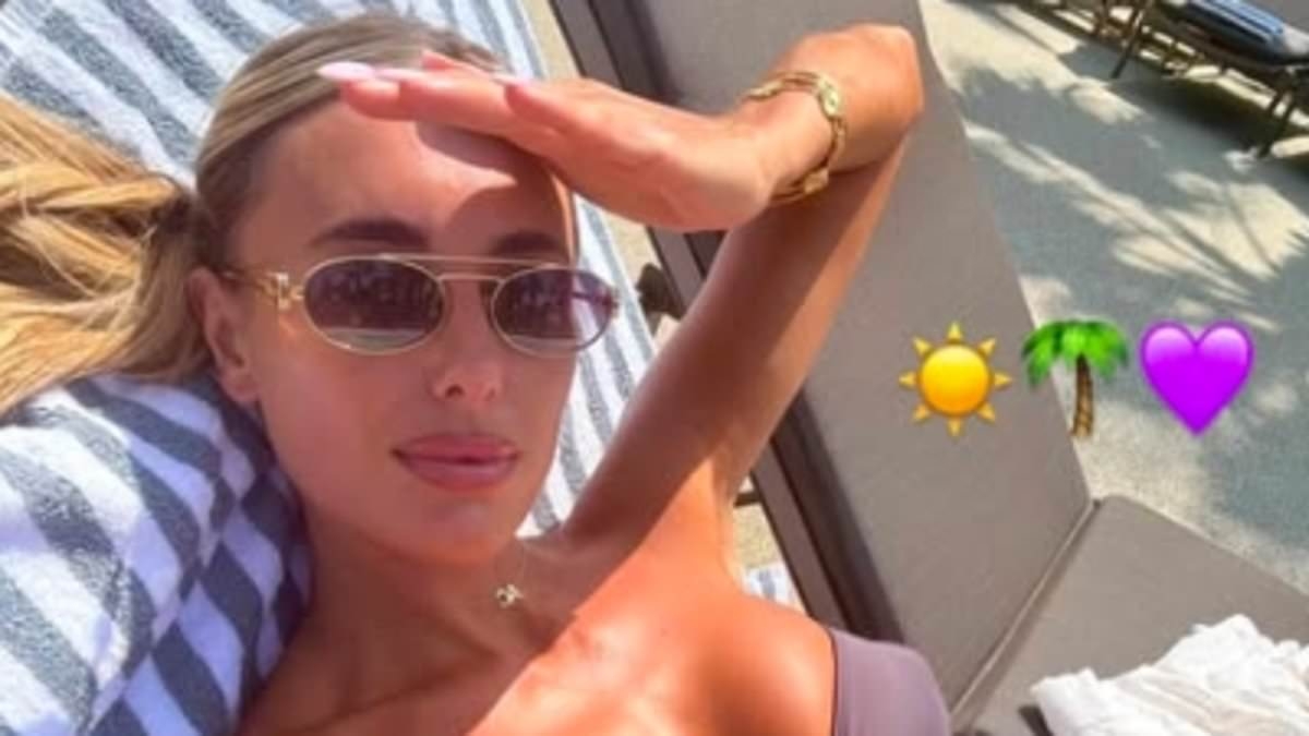 TOWIE's Amber Turner shows off her toned and tanned physique in a purple bikini as she soaks up the sun in Portugal amid filming for latest series