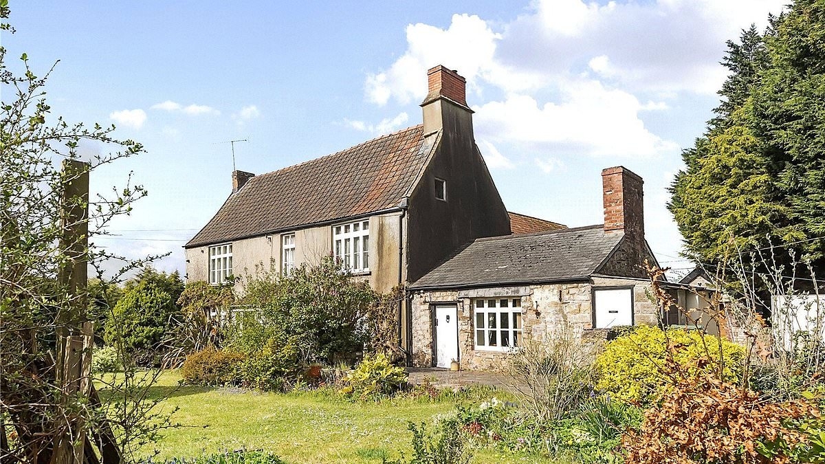 12th-century Welsh manor with full banqueting hall goes on sale for the same price as a London flat...but which would YOU choose