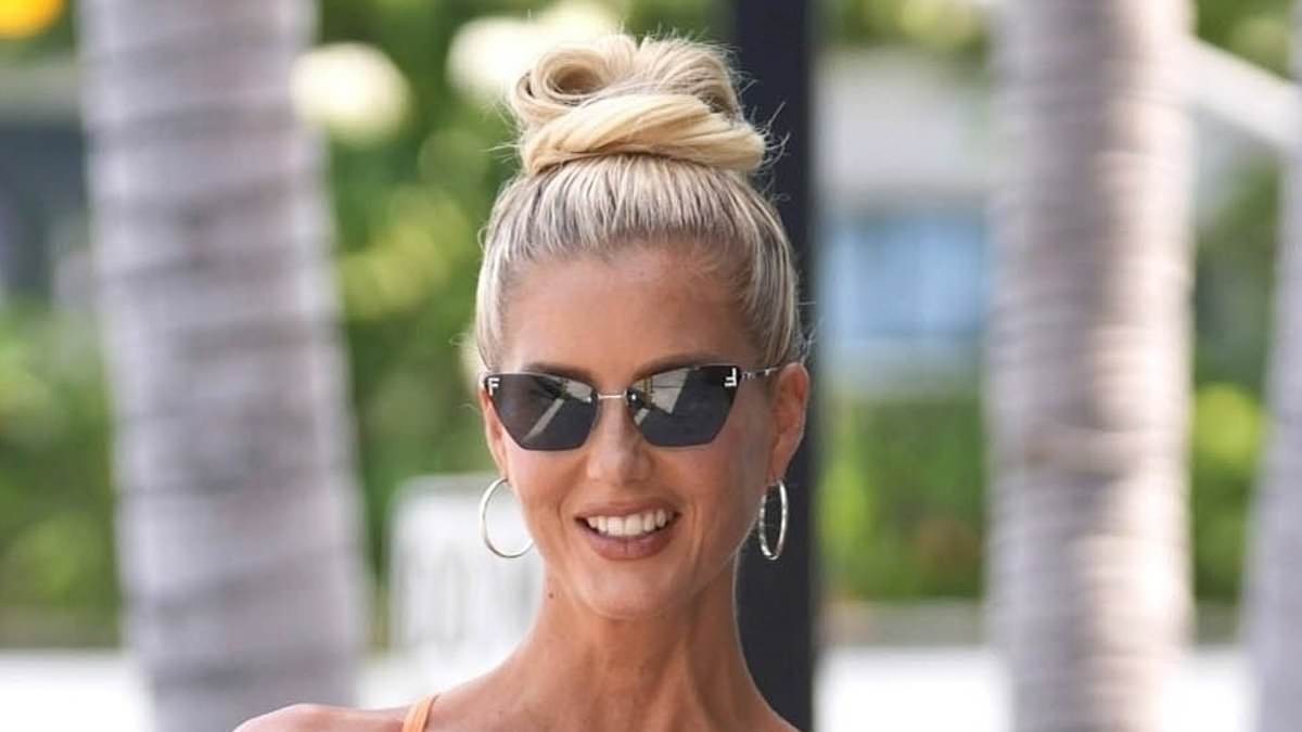 Selling Sunset's Emma Hernan flaunts her incredible physique in an orange gym co-ord amid her feud with co-star Chrishell Stause