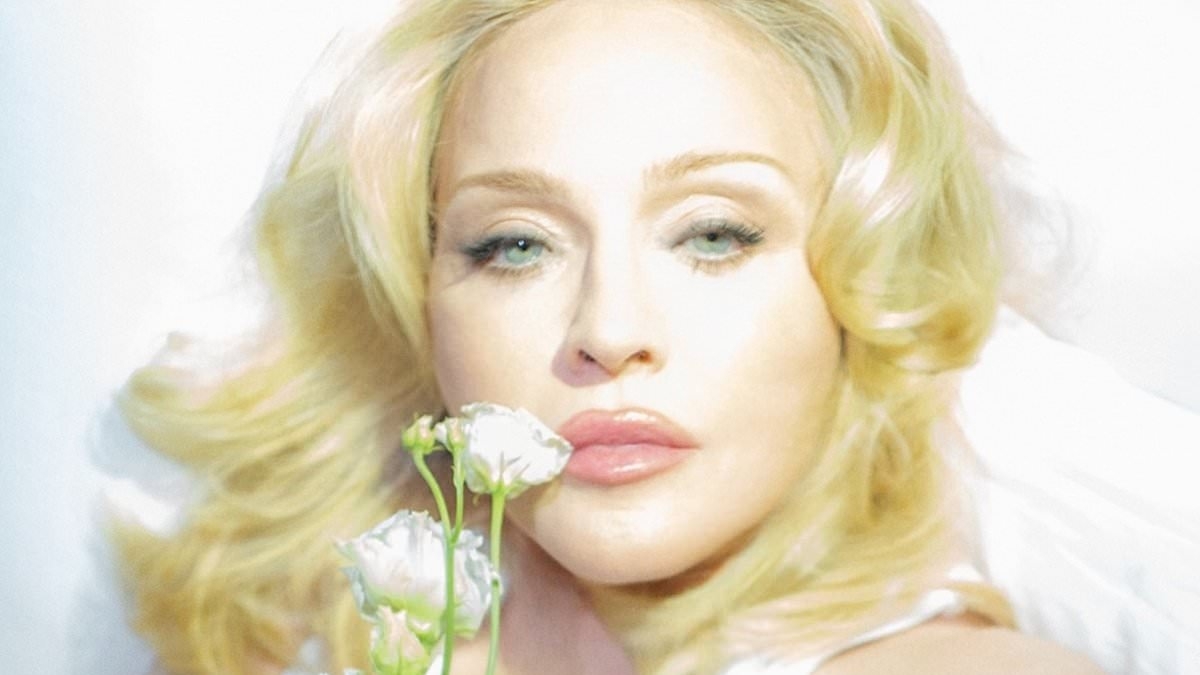 Braless Madonna, 66, puts on a very racy display as she poses in a white tank top and lace underwear to mark Pride Month