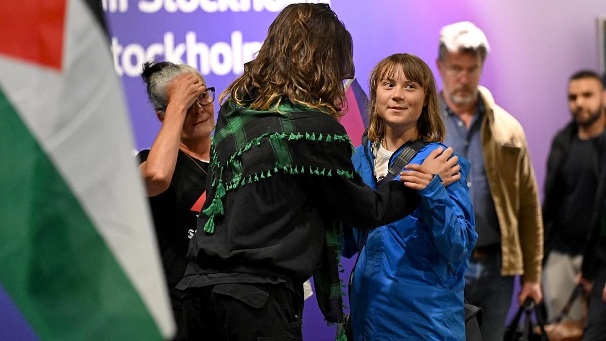 Greta Thunberg covers head during departure from Israel