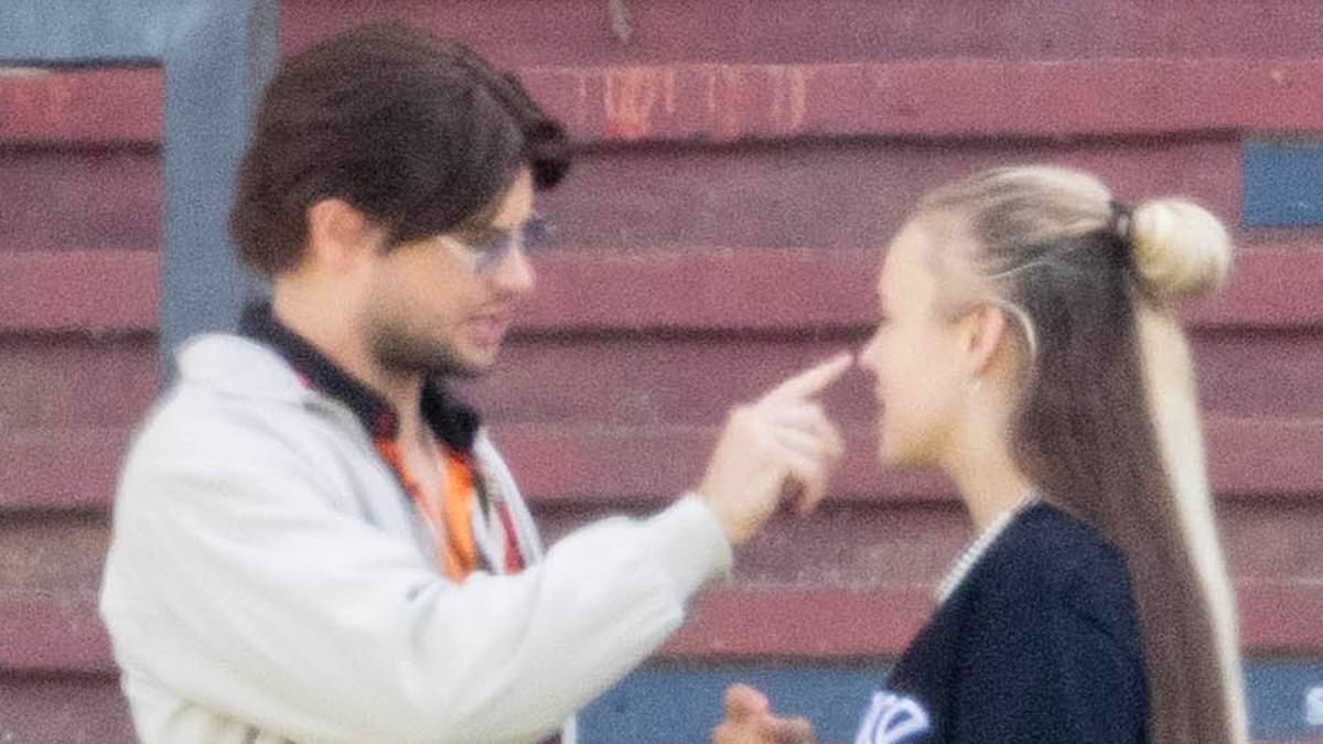 EXCLUSIVE Chris Hughes dresses up in wigs and looks very smitten with JoJo Siwa during a shoot at Sandown Racecourse after his girlfriend hit back at her idol Miley Cyrus over sexuality comments