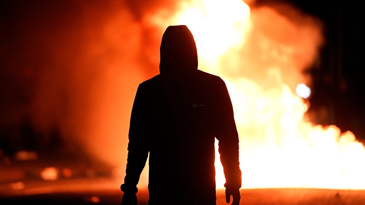 Family of girl 'sexually assaulted by Romanian teens' plead with Ballymena rioters to end violence as town braces for fourth night of chaos