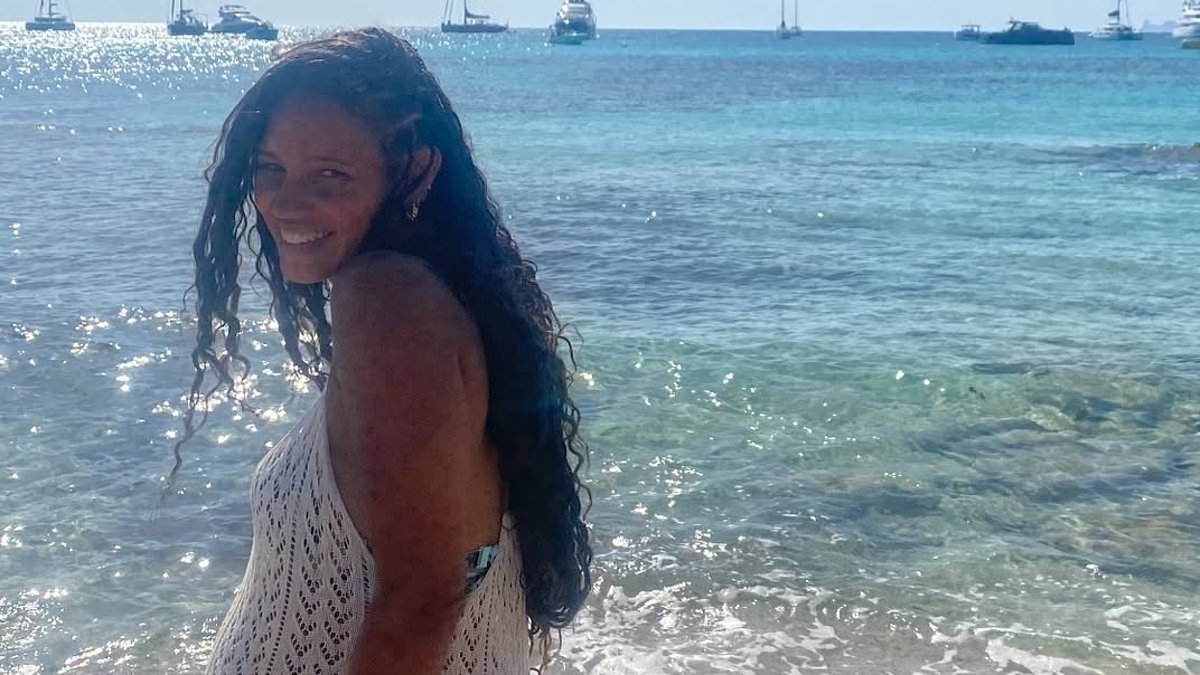 Pregnant Vick Hope shows off her growing bump in a crochet dress in Ibiza as she prepares to welcome her first child with Calvin Harris