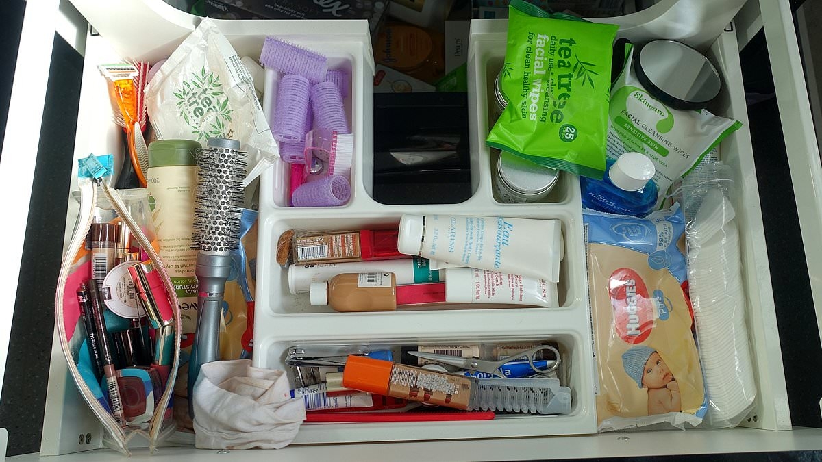 You're organising your bathroom cabinet wrong! Expert reveals the surprising items you should never store in there