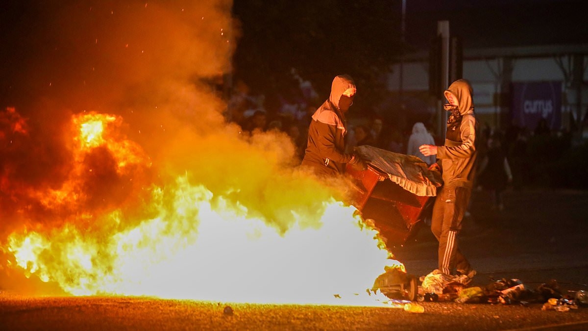 EXCLUSIVE Inside the Ballymena riots: How 'attempted rape of local girl, 16, by two Romanian teens' ignited wave of anti-migration backlash on the streets of Northern Ireland