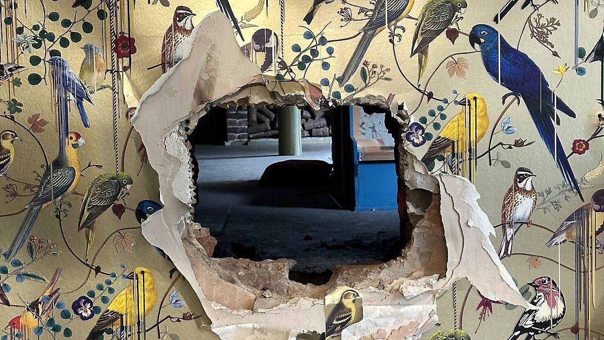 How I watched the CCTV in horror from my bedroom as thieves TUNNELLED into my store and stole 55 handbags worth £260,000 in just three minutes
