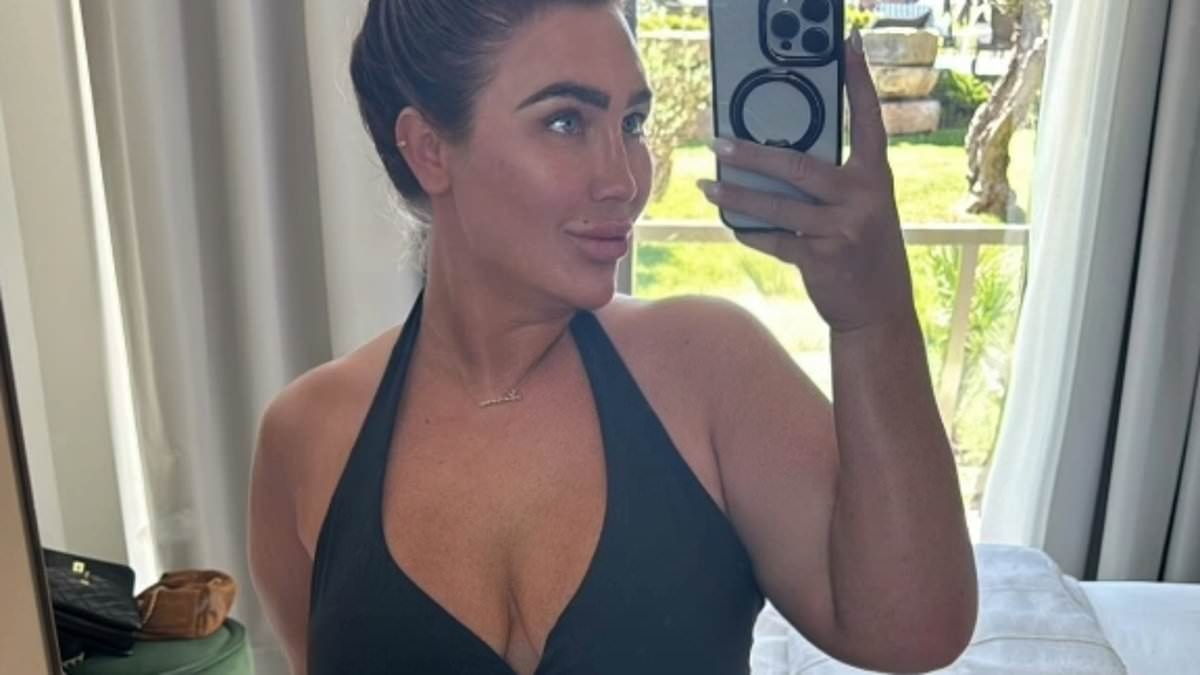 Lauren Goodger puts on a very busty display in a black swimsuit after jetting off to Portugal to film the new series of TOWIE