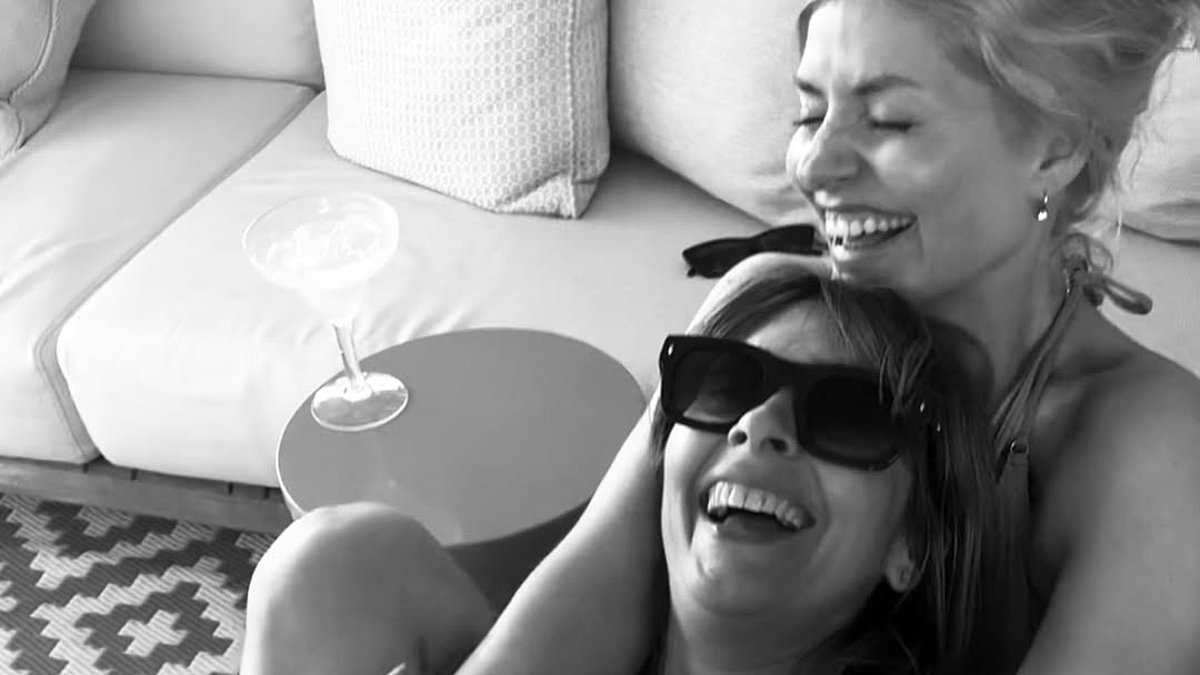 Holly Willoughby looks in good spirits as she enjoys girls' night in with Nicole Appleton - after two of her shows are axed just months apart