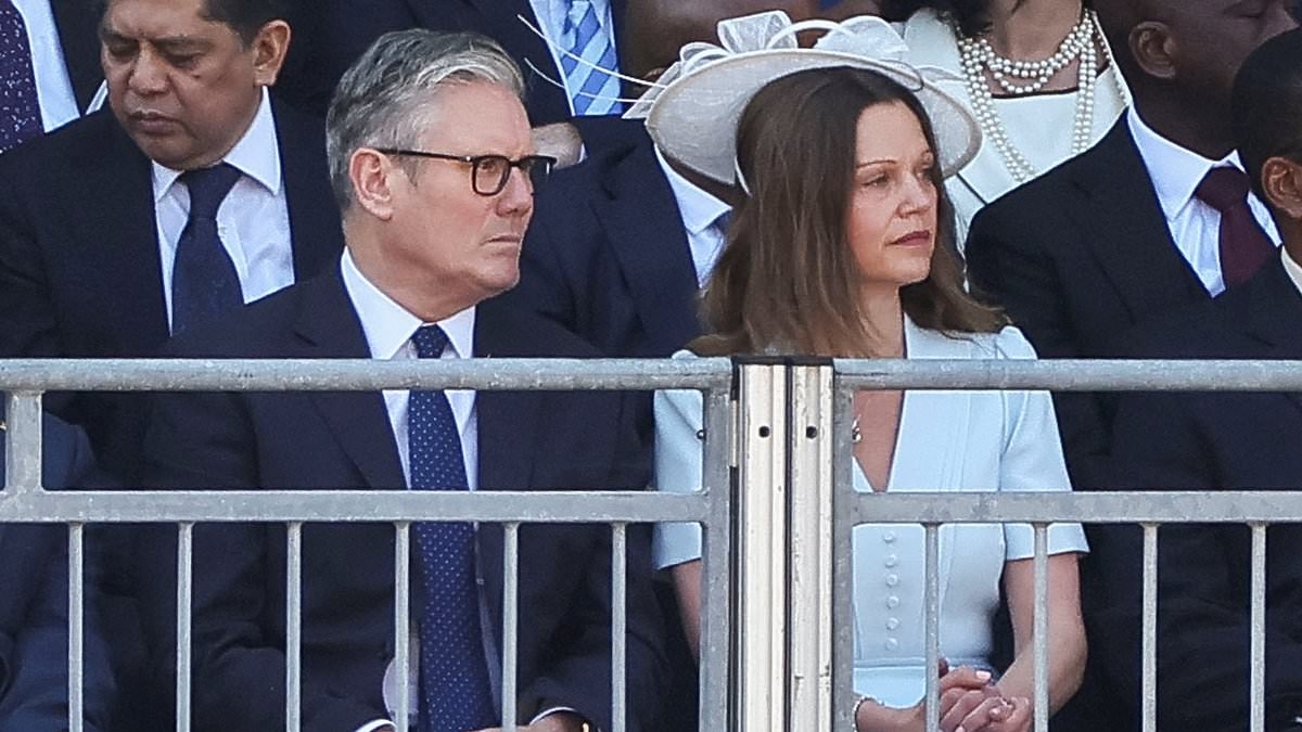 'God Save the King!': Victoria Starmer looks effortlessly chic in white summer dress as she joins PM Keir Starmer for Trooping the Colour