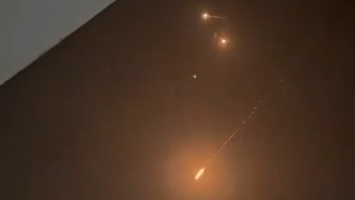 Israel urges US to join bombing as Iran sends HUGE missile shower: Tower block turns to rubble with at least 13 dead and hundreds more injured amid retaliation strikes that leave Tehran 'burning'