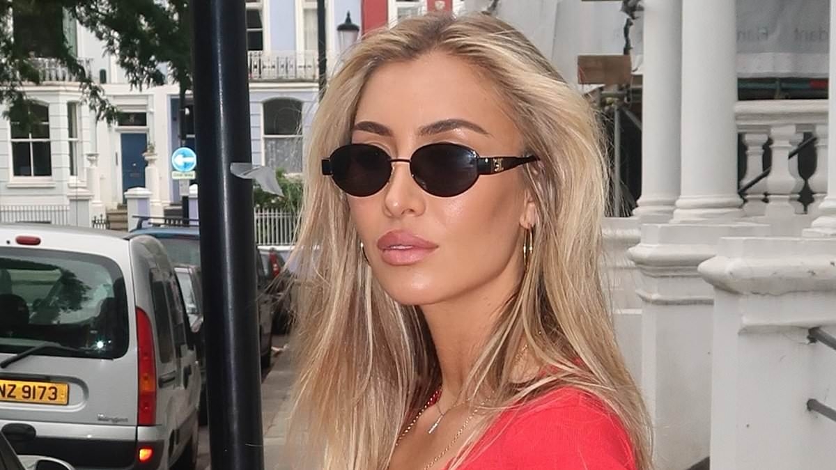 Pregnant Sophie Habboo shows off her baby bump in a chic red co-ord as she shares series of stylish snaps after revealing she is expecting first child