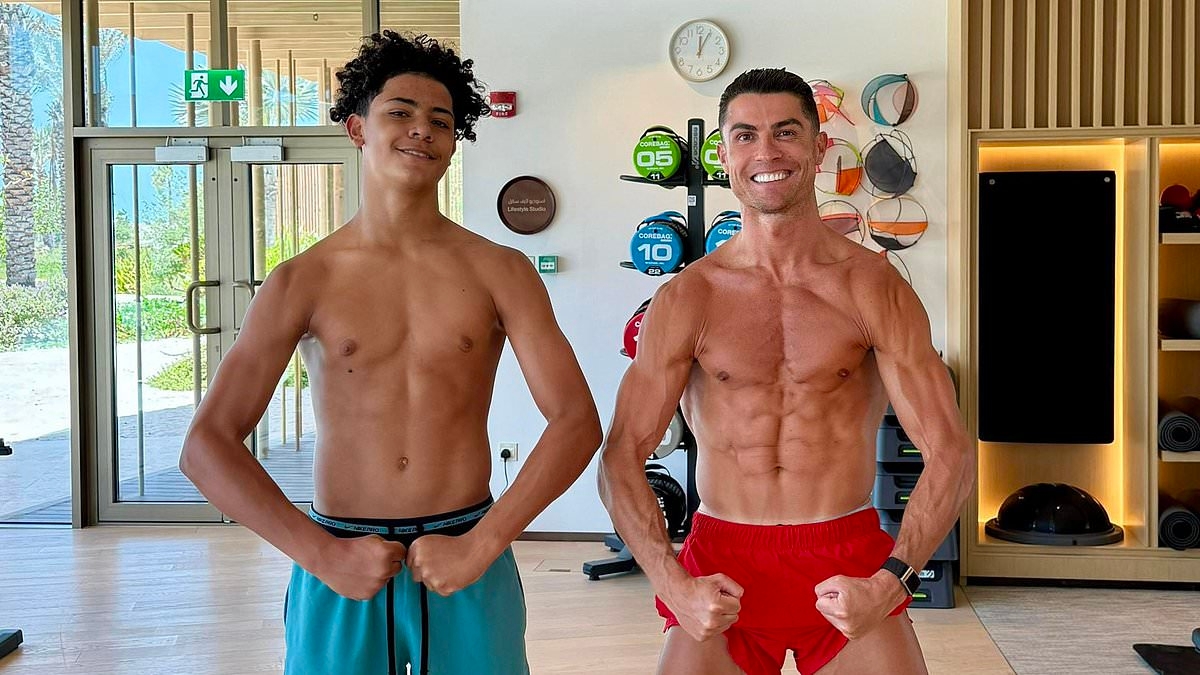Like father, like son! Cristiano Ronaldo, 40, and son Cristiano Jr, 14, show off their matching ripped physiques as they cause social media stir