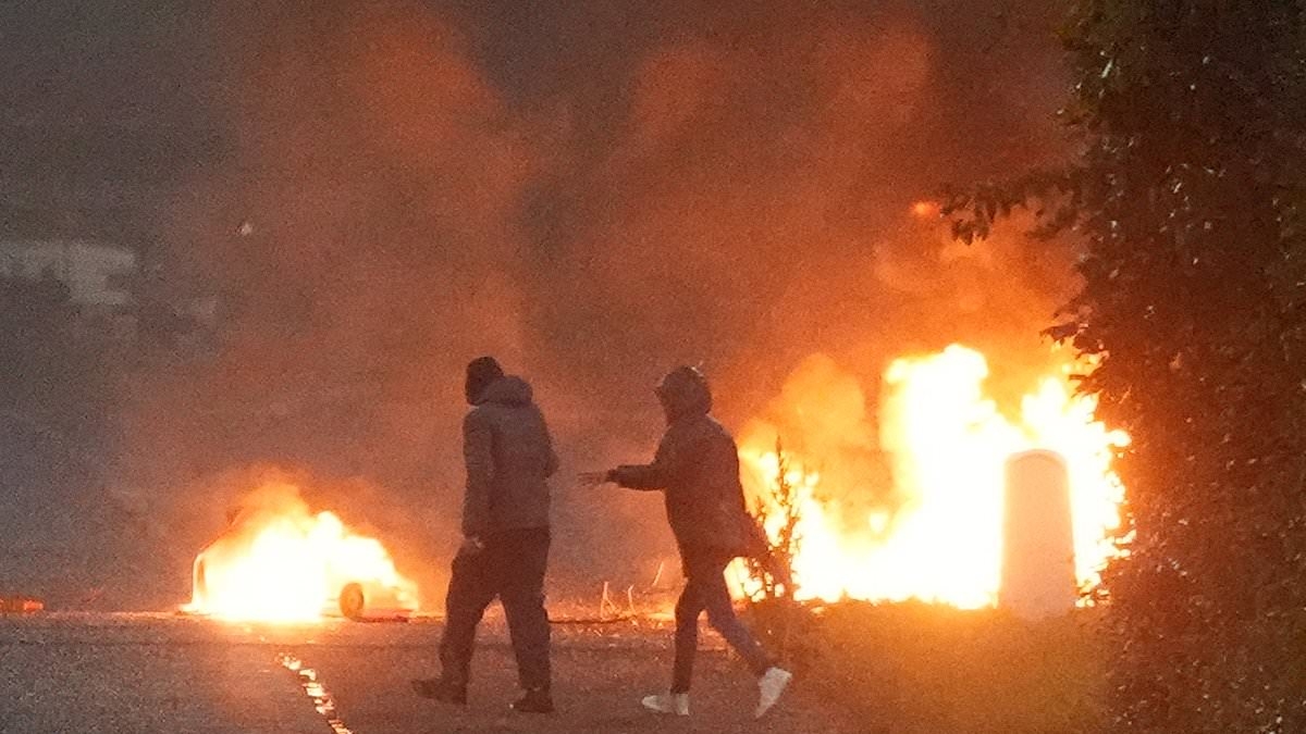 Police are working 'night and day' to catch Ballymena rioters after alleged sex attack on local girl sparks violent disorder