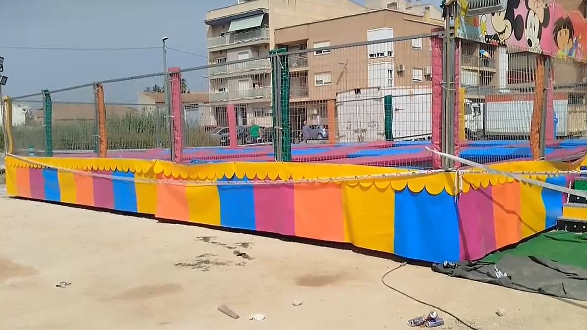 Fairground trampoline horror as girl, two, dies after bouncing into electrified fence