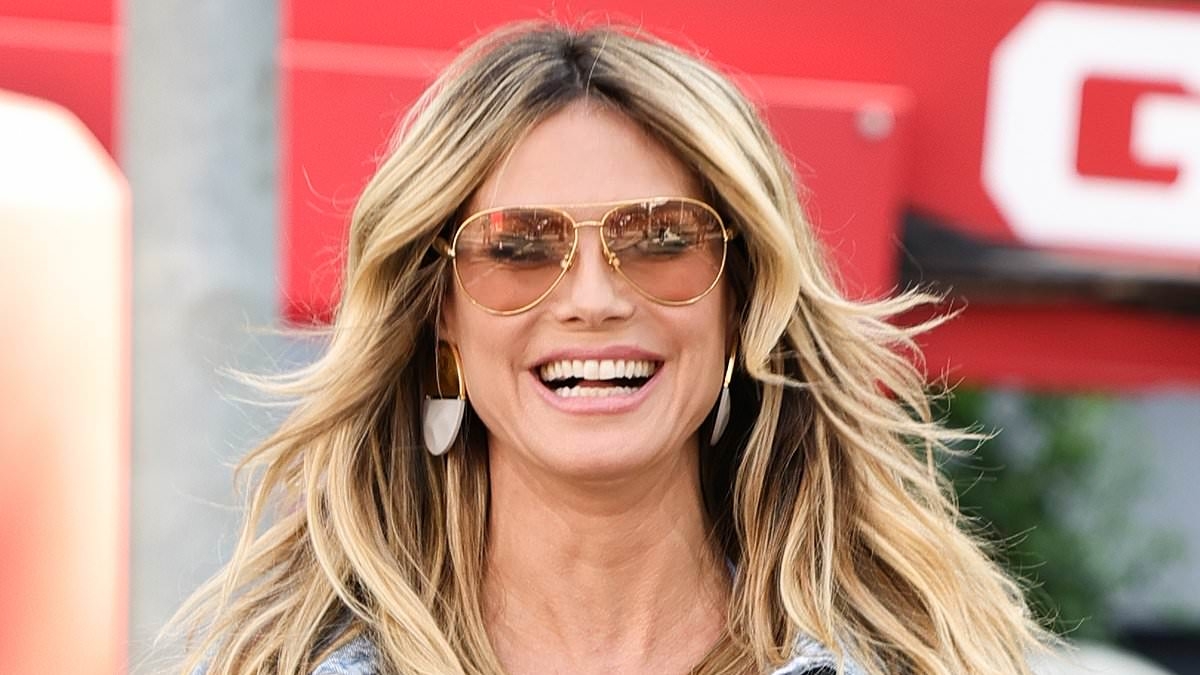 Heidi Klum sizzles in double denim and bikini top for Calzedonia billboard shoot