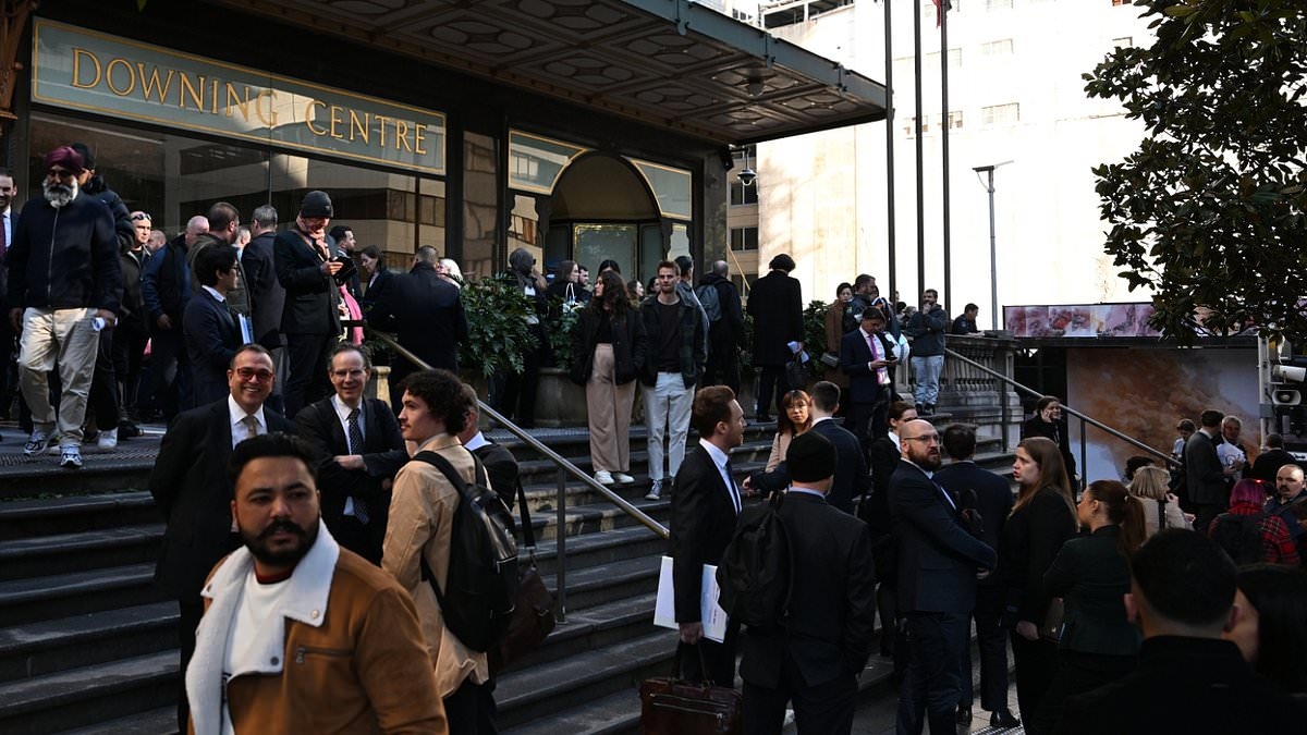 BREAKING NEWS Chaos as burst water main shuts down Sydney's busiest court and plunges thousands into darkness